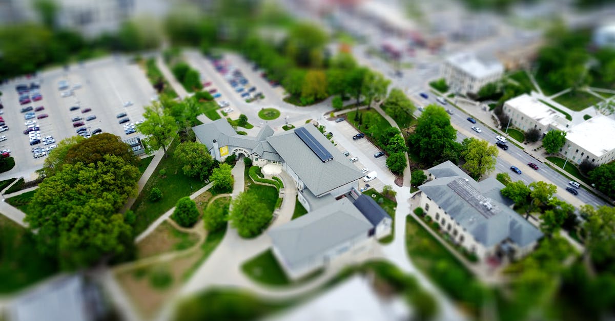 Aerial view of campus with green landscaping and parking, Manhattan, KS